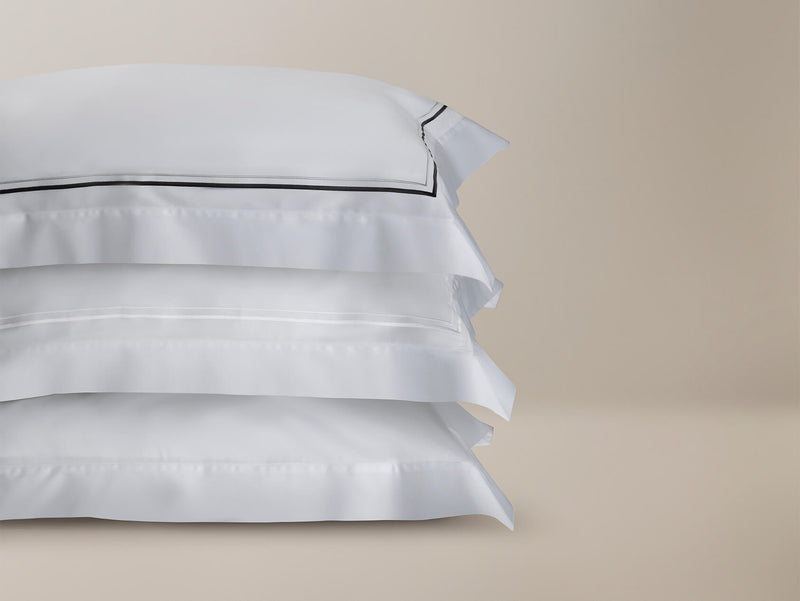 Stack of sateen pillowcases