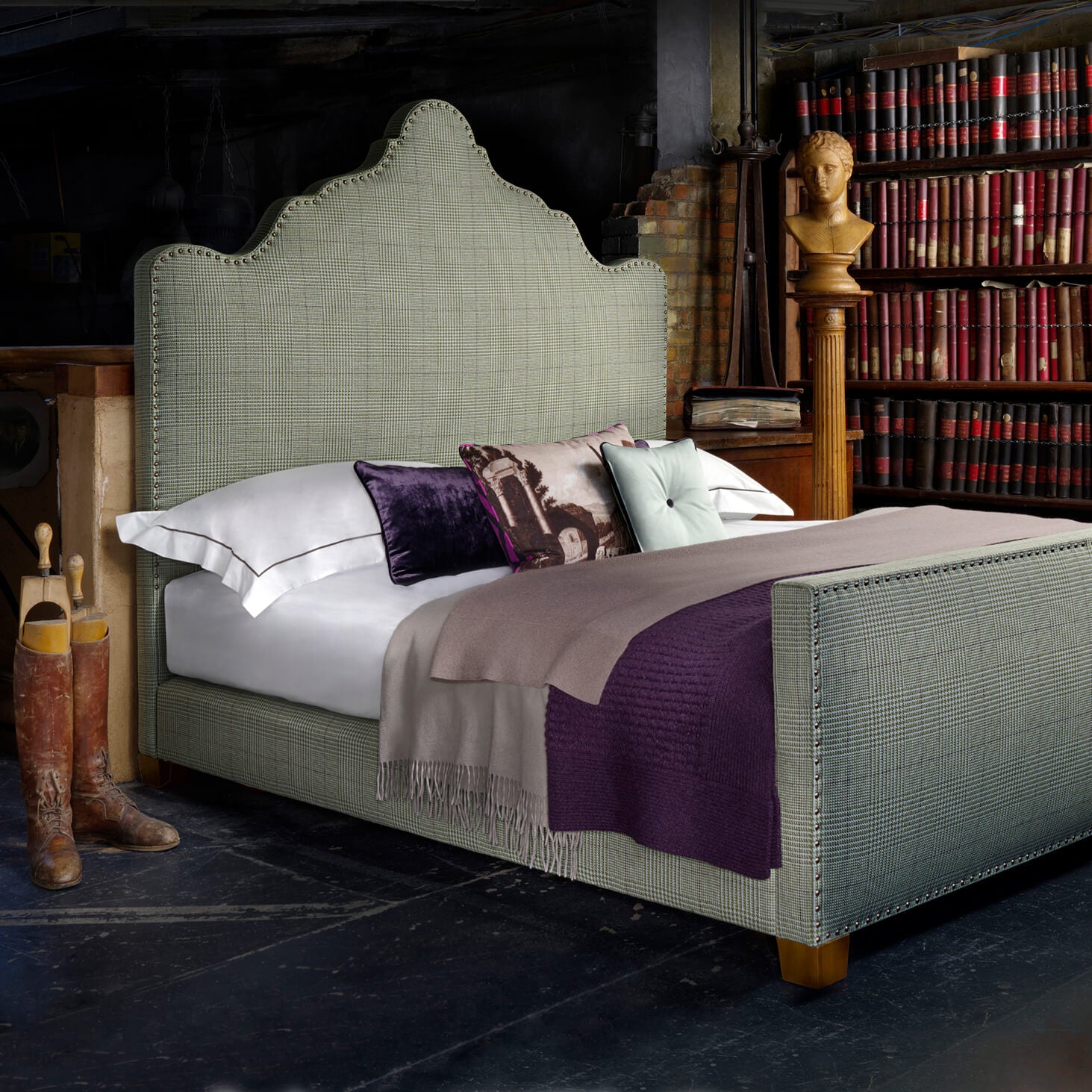 The Gorrivan handmade bed completely dressed and set in a room