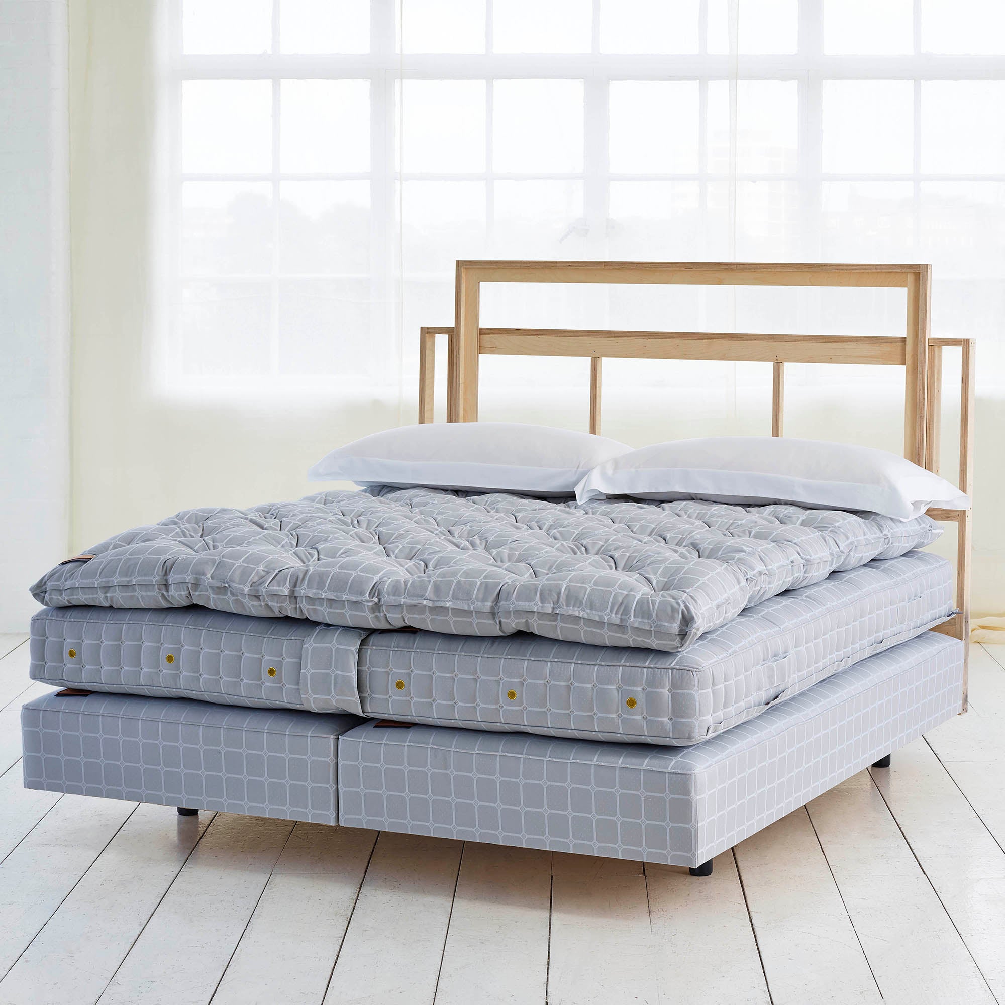 Savoir bed featuring the bed set no2 with the mattress, the base and the topper.