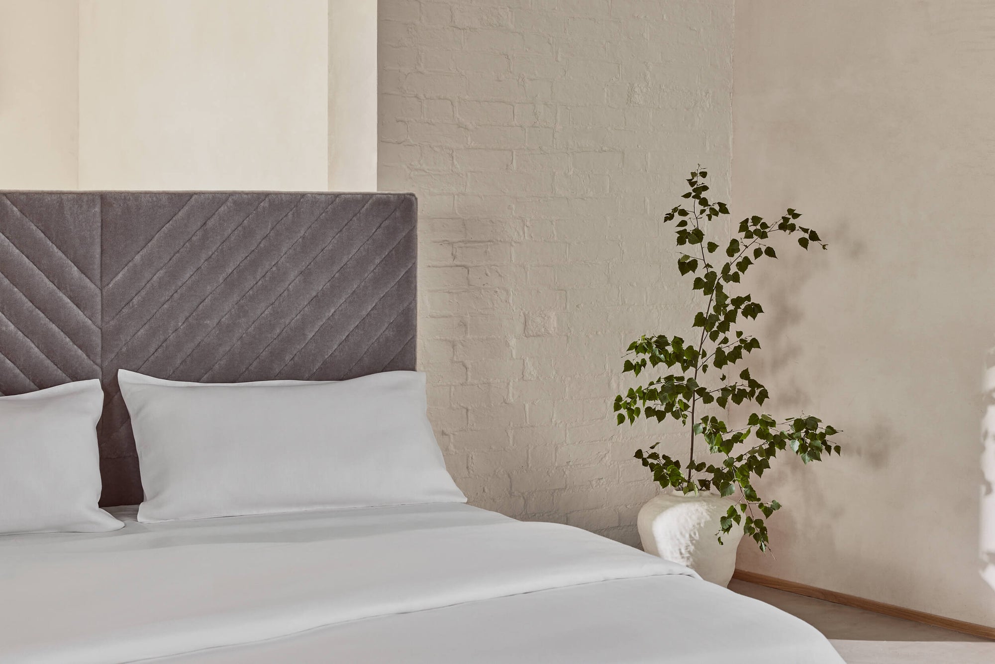 Closeup of Savoir white herringbone linen