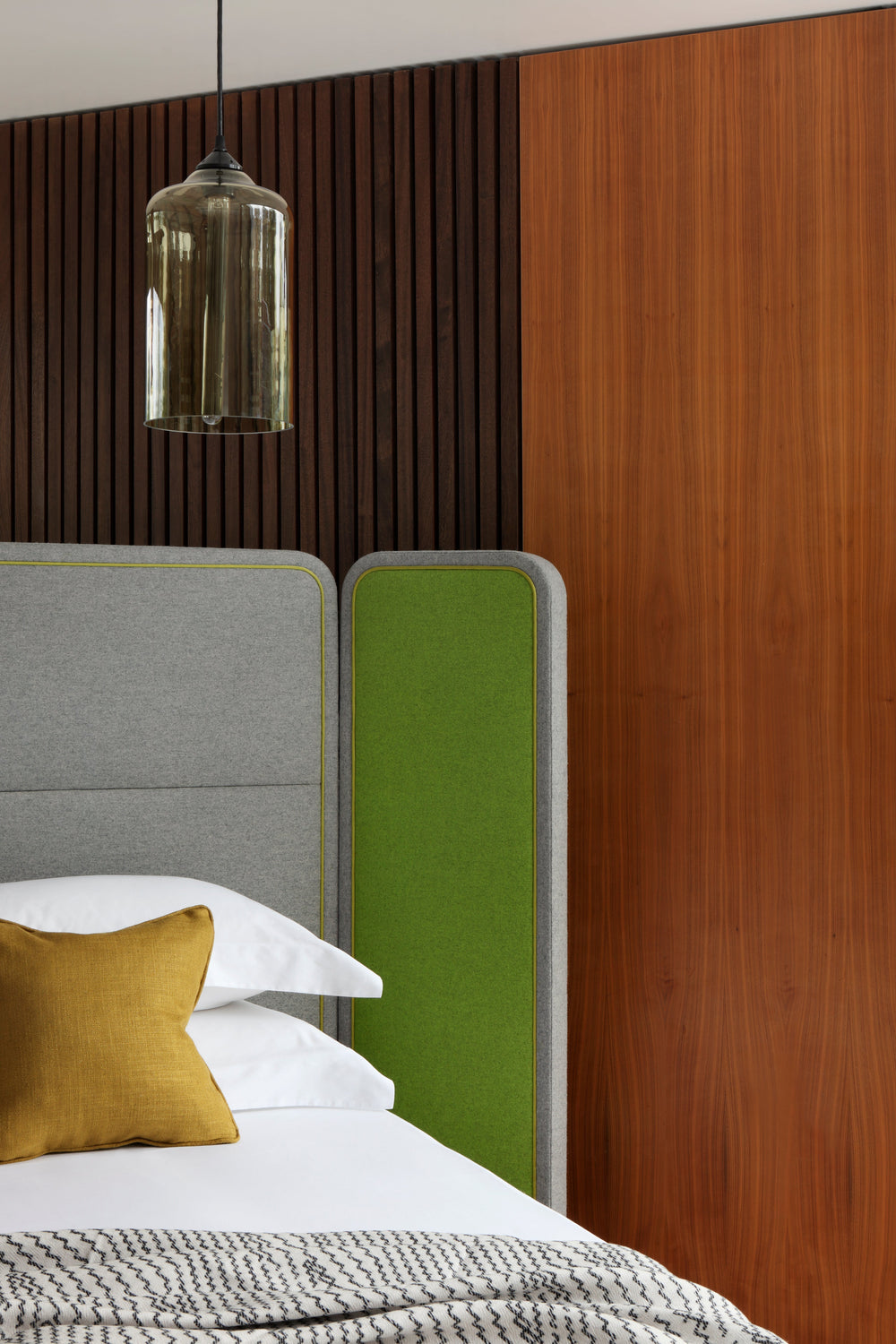 Designed by architect Steve Leung, Screen draws upon the vibrant history of Chinese artisanal furniture, showcasing dual-hinged side panels and gentle curved details.