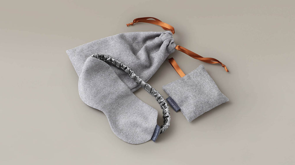 silk sleeping mask, elegant lavender bag and a travel pouch, all in calming grey.