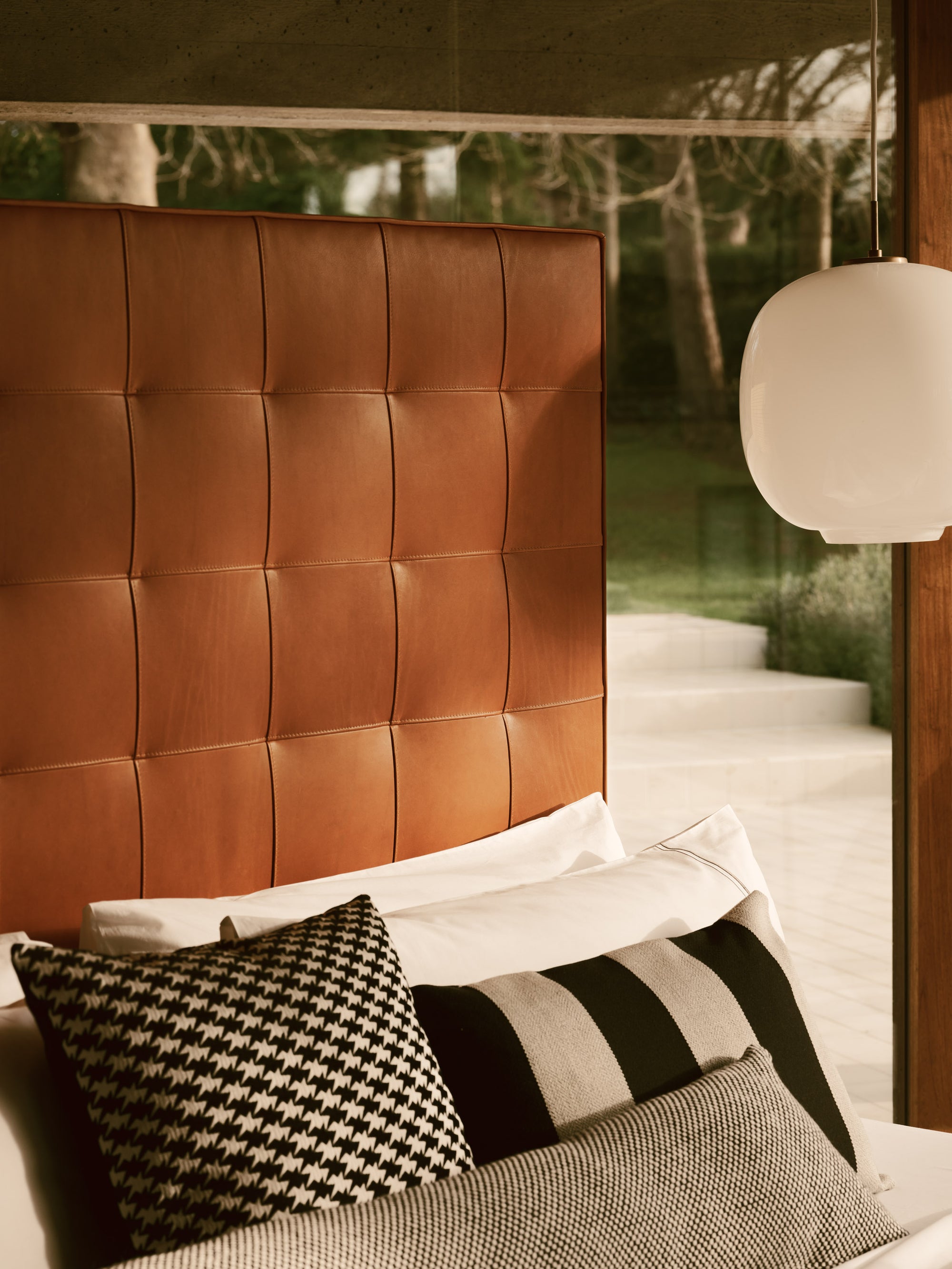 Close-up the Savoir Winston stitched panel headboard