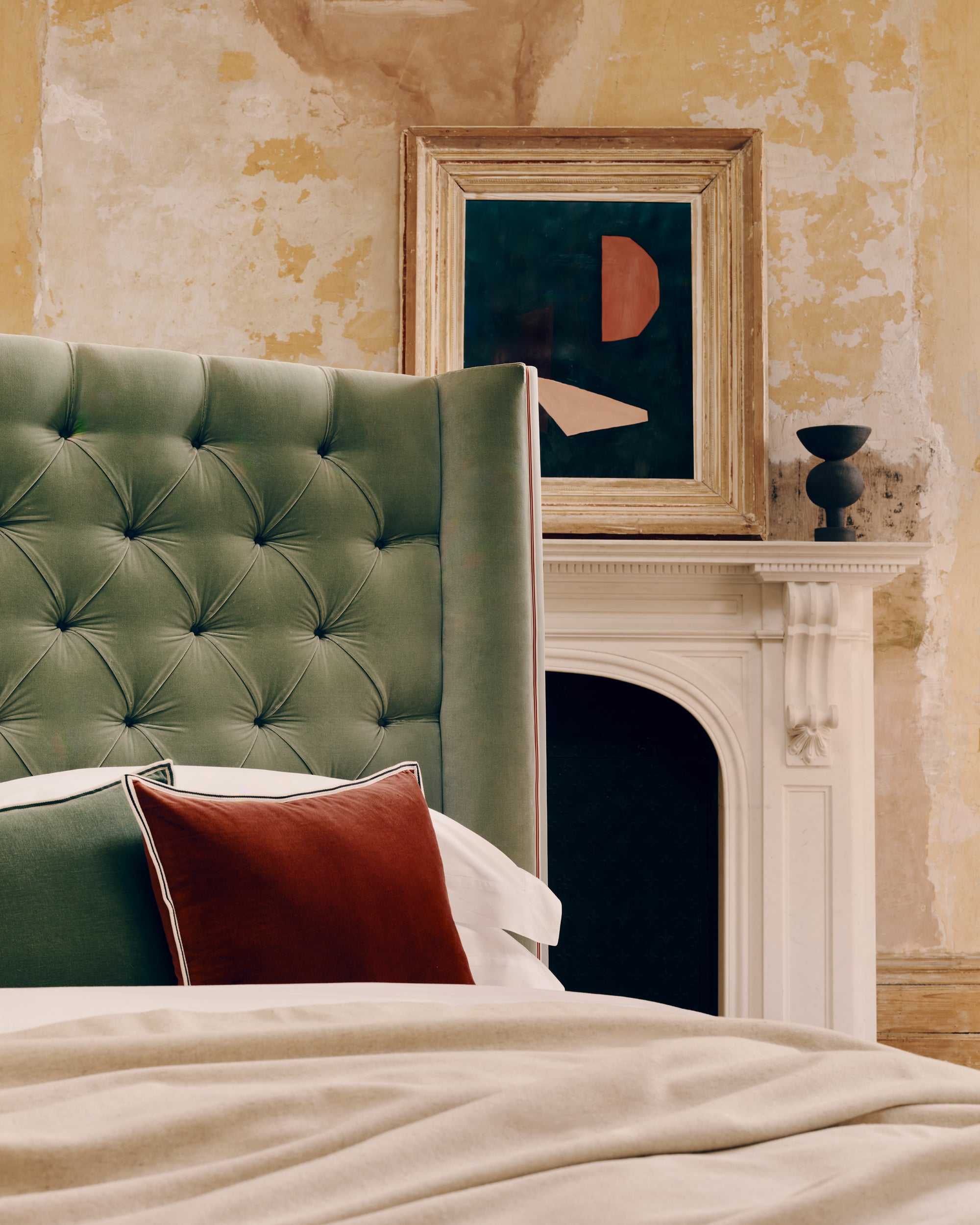 Detail of Hugo bed with deep buttoning on headboard