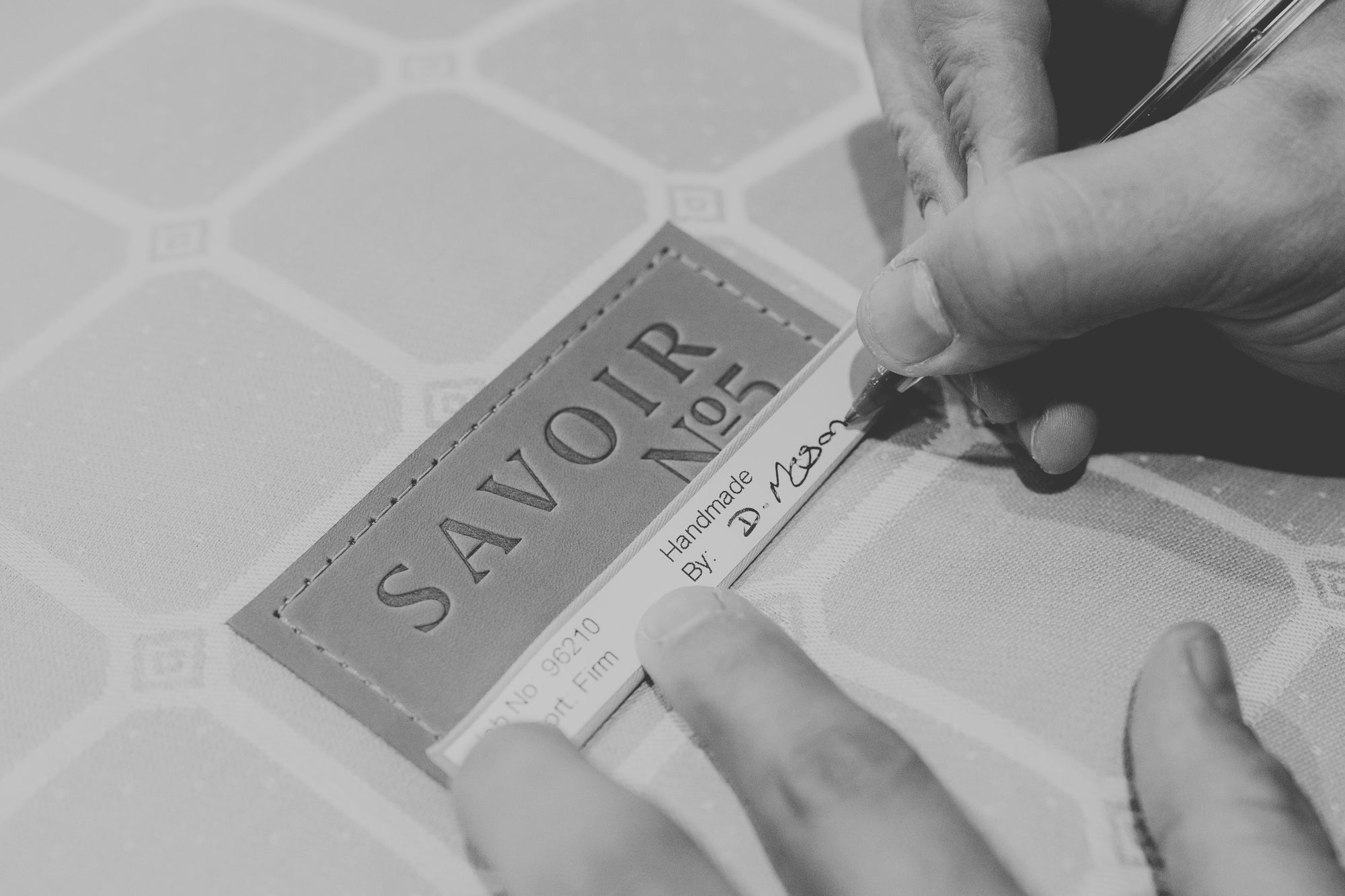 A Savoir No5 label with the craftsman's signature