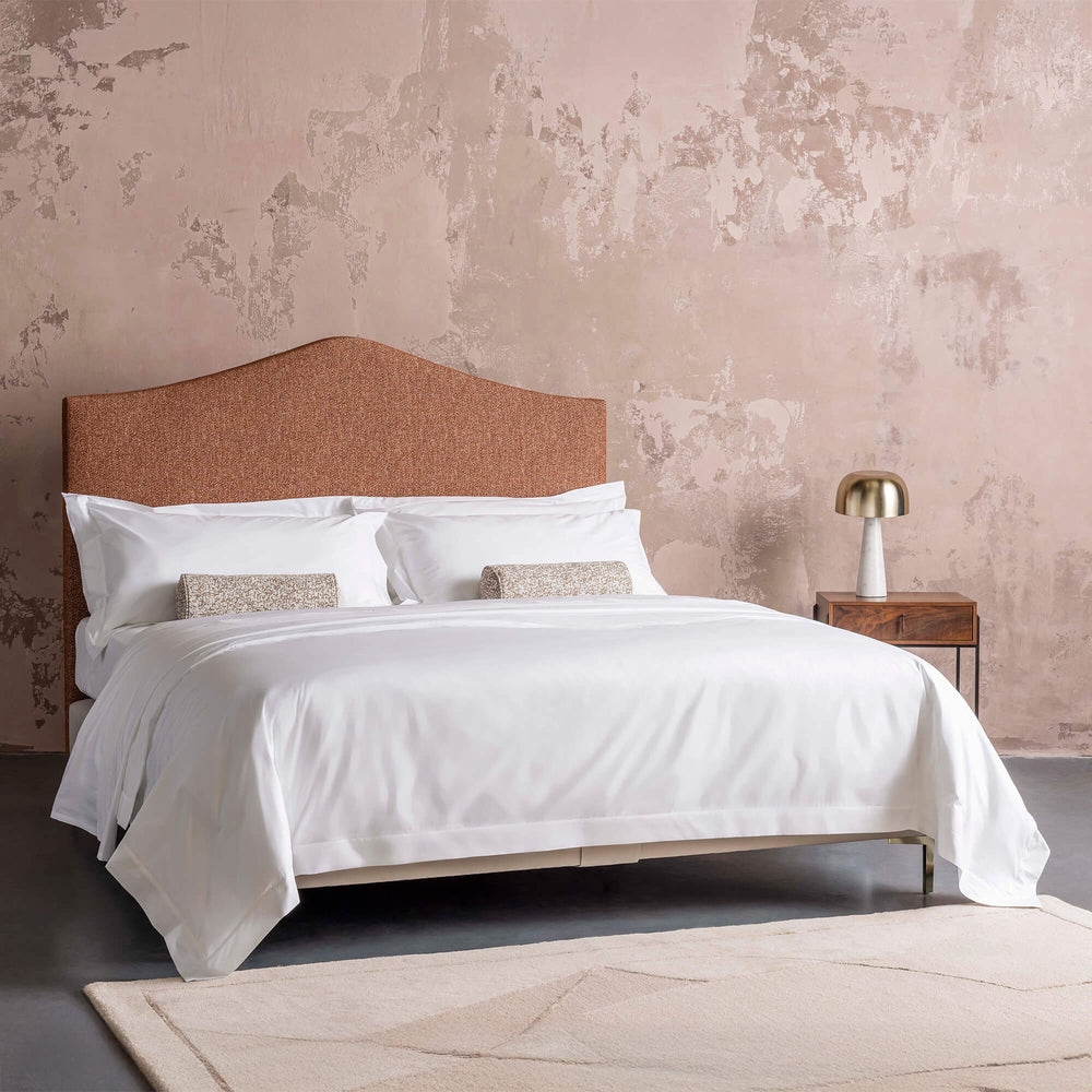 Savoir Alex bed completely dressed with cushions