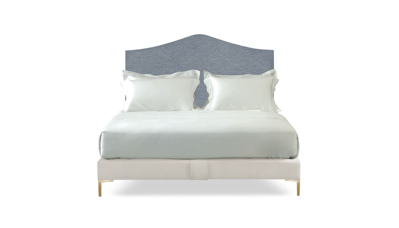Undressed Alex bed with a sky blue fabric on headboard, featuring cushions