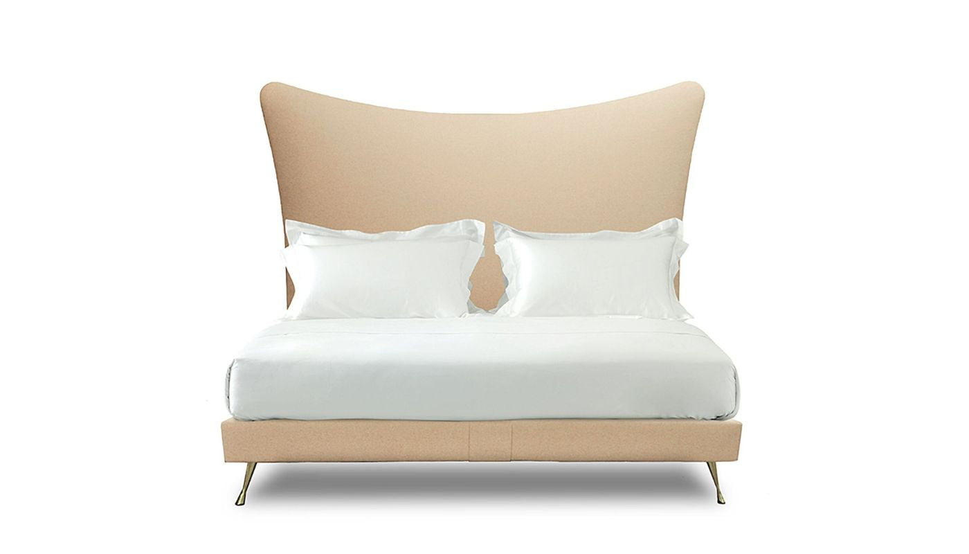 Undressed Amelia bed with a beige fabric on headboard and base, featuring cushions