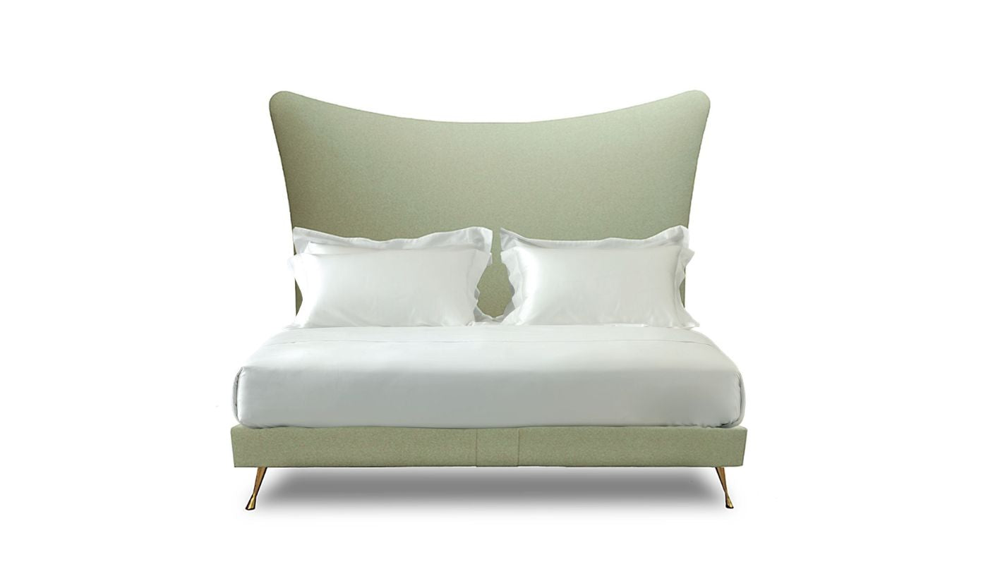 Undressed Amelia bed with a lime green fabric on headboard and base, featuring cushions