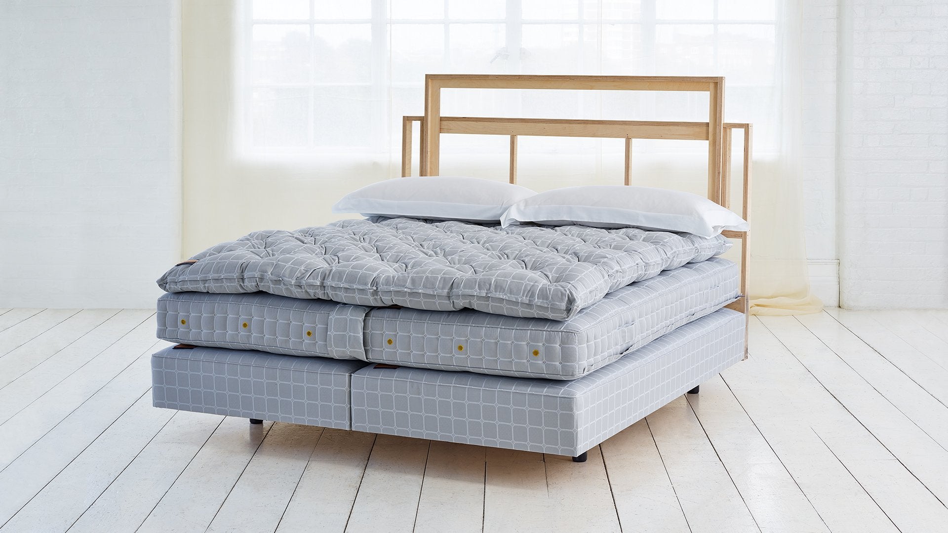Bed set No2 side view with the topper, the mattress and the base