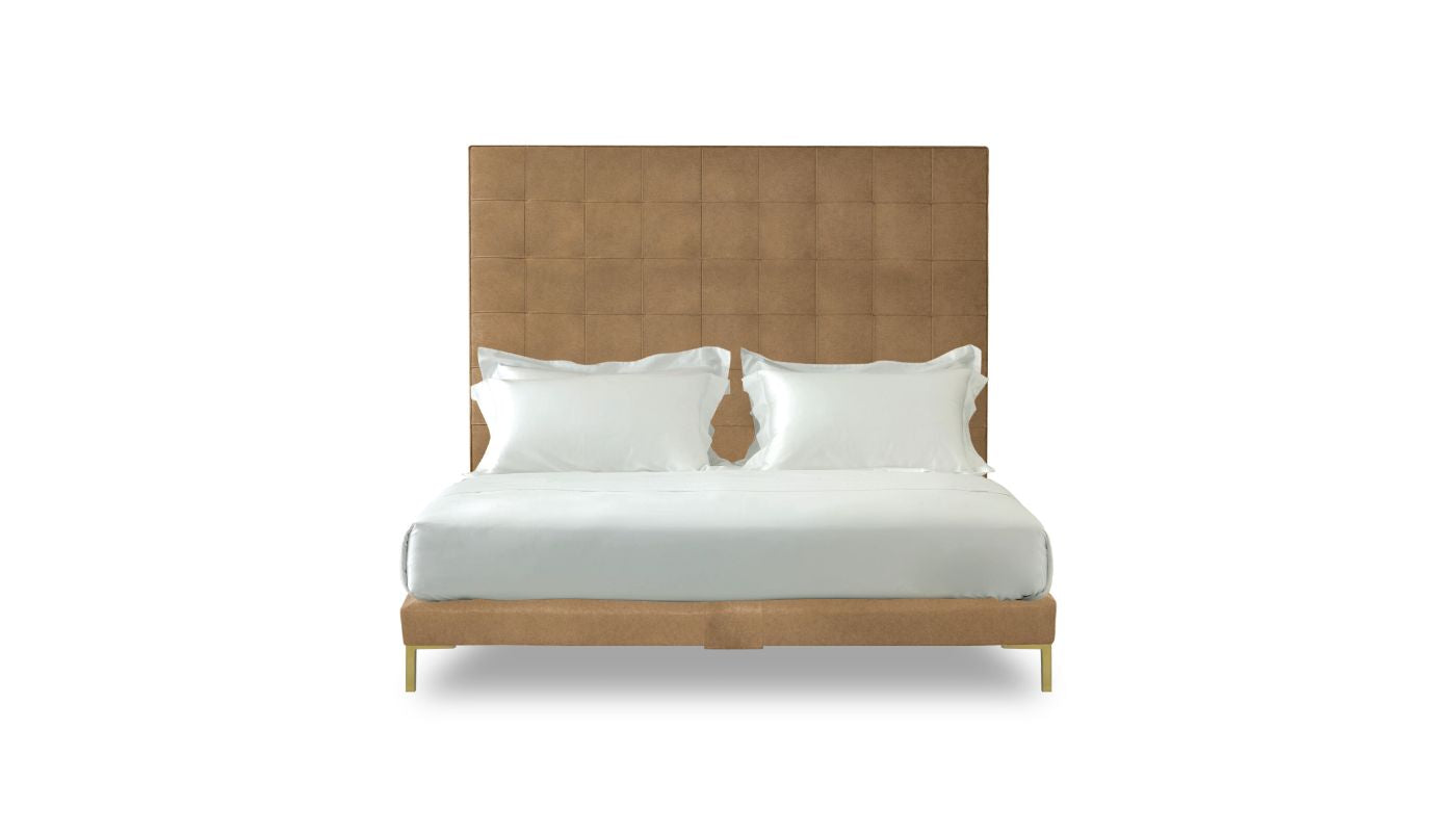 Undressed Winston bed with a beeswax colour headboard and base featuring a mattress and cushions