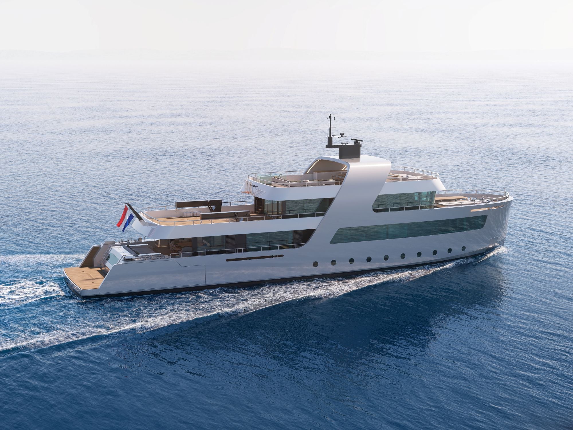 A modern white luxury yacht sailing on a calm blue ocean, viewed from an elevated angle. The yacht features multiple decks, large tinted windows, a wooden deck on the lower deck, and a small Dutch flag flying from the stern.
