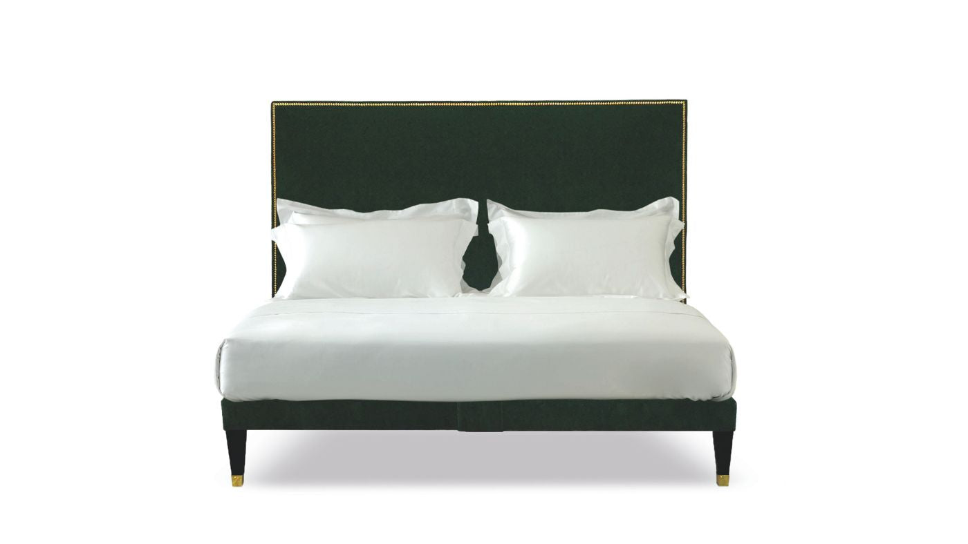 Undressed Harlech bed with nailed edges and green forest headboard and base
