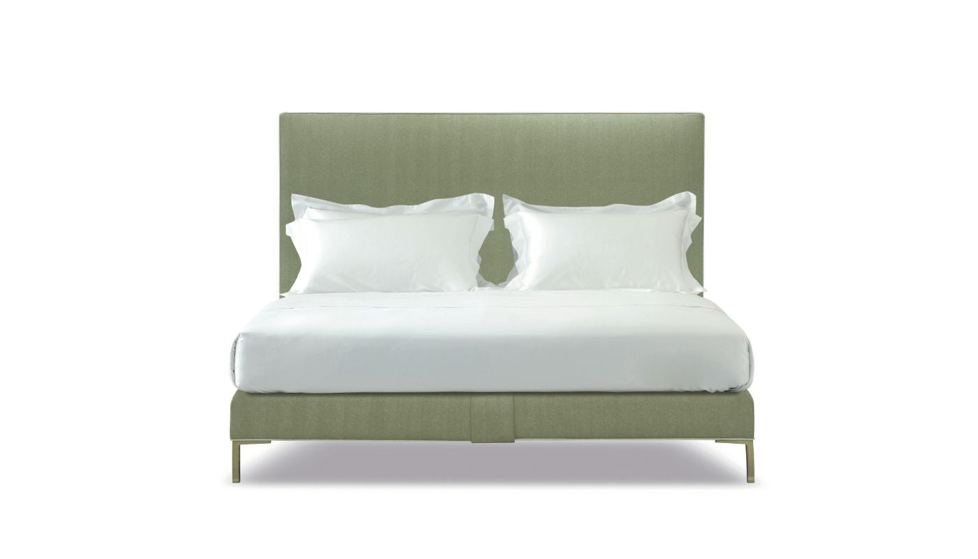 Undressed Harlech bed with piped  and lime green headboard and base