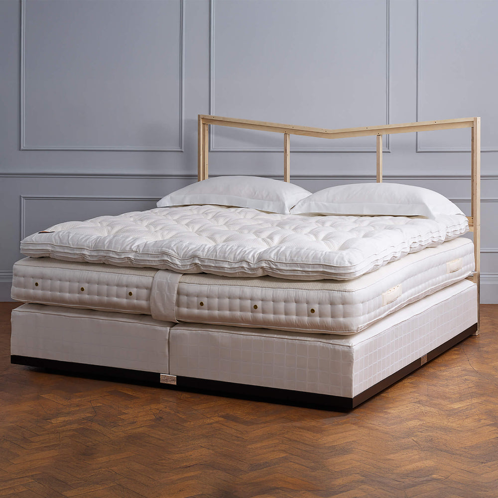 Savoir bed featuring the bed set no1 with the mattress, the topper and the base.