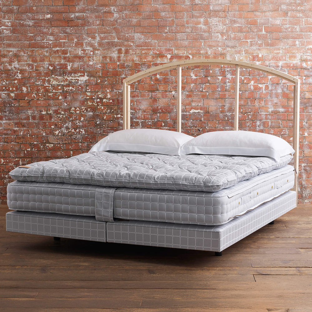 Side view of a Savoir No4 bed set with details of the headboard frame
