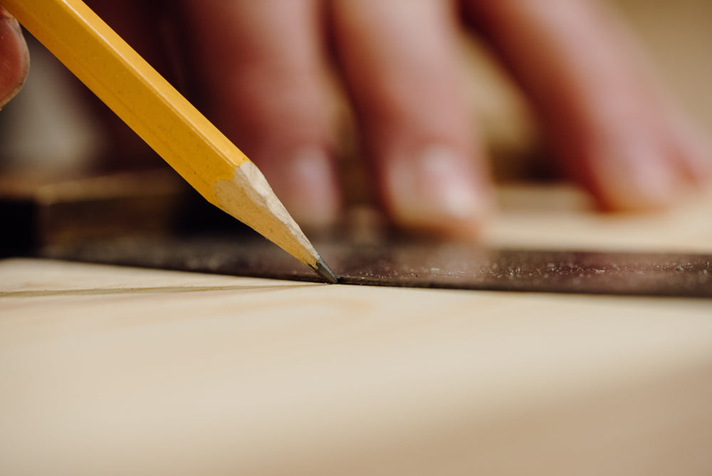 A Savoir craftsman doing some woodwork