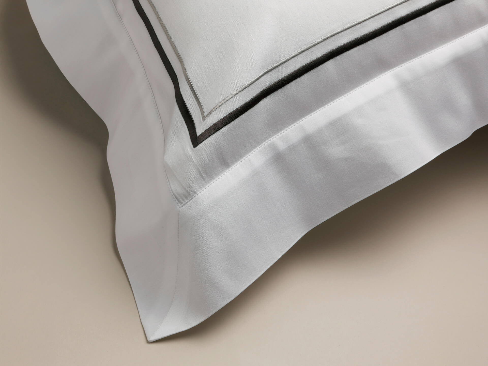 Grey corded detail on a Savoir pillowcase