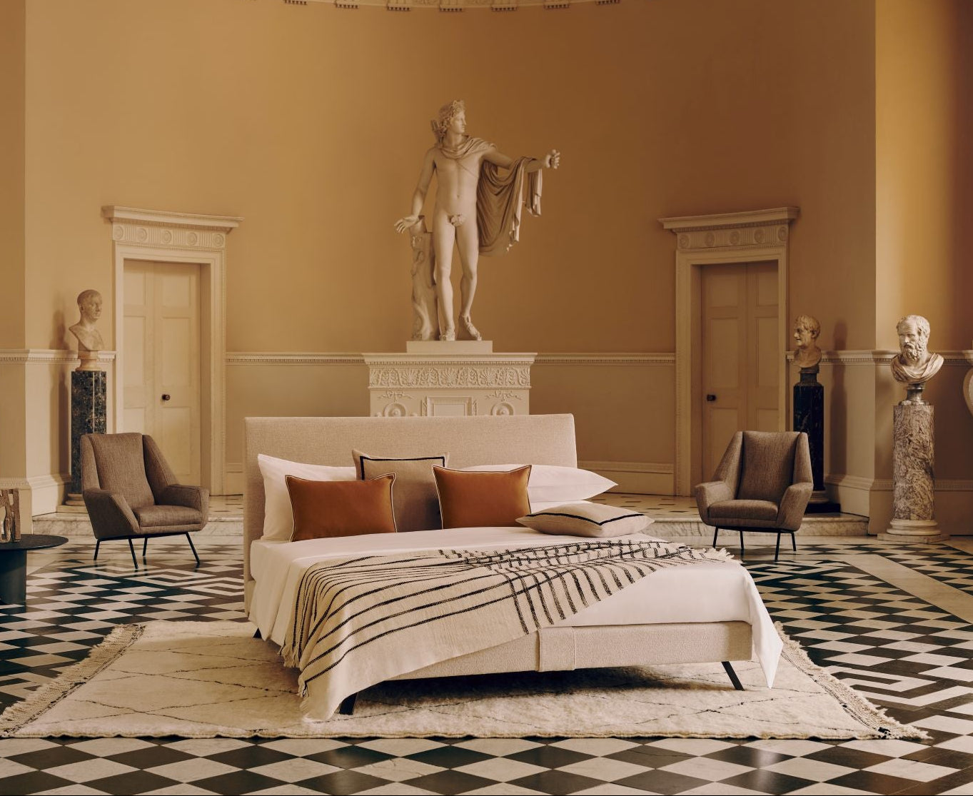 Stately bedroom with the Ian bed  classical statues and decor
