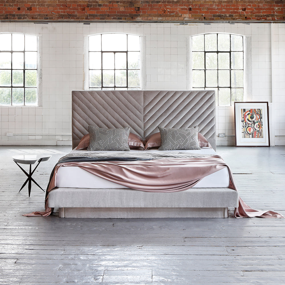 Savoir Stella bed completely dressed with cushions
