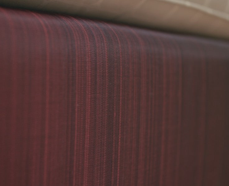 Close-up detail of horsehair with red tones