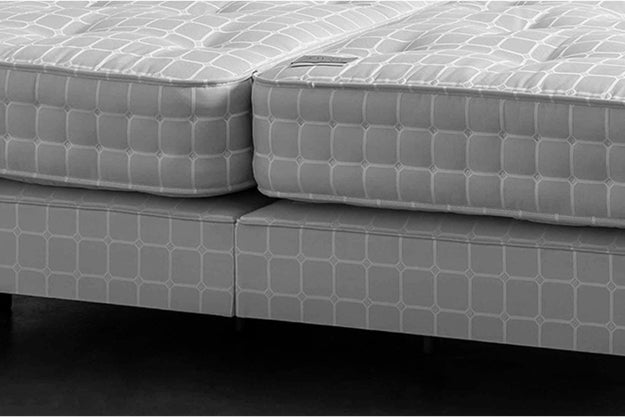 Side view of a split mattress and base
