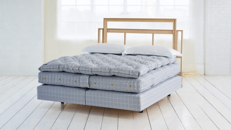 Image of a No2 luxury bed set with box spring, mattress, topper and stripped back custom headboard. Available in a range of sizes including custom emperor sized bed.