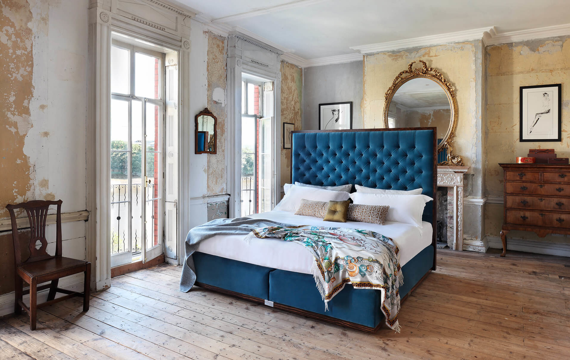 A Savoir 'State' bed design in rich blue velvet accentuated with a walnut border around the headboard and bottom of its base, paired with the luxurious No1 bed set.