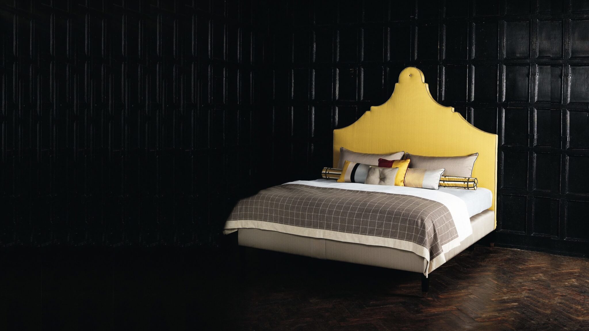 The Rococo inspired Claudia headboard with a No 2 bed set, upholstered in a bright yellow cotton fabric with contrasting taupe base