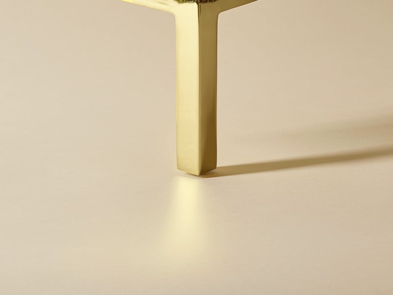 Gold metal leg for a Savoir bed