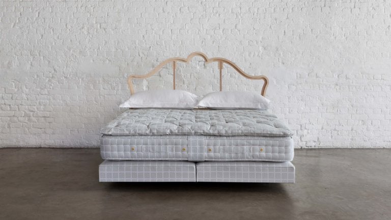 Image of a No 4 vegan bed set with a stripped back headboard frame