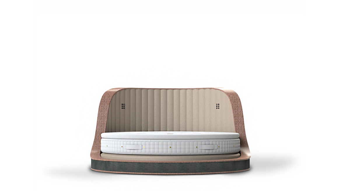 The round rotating bed in a neutral colourway