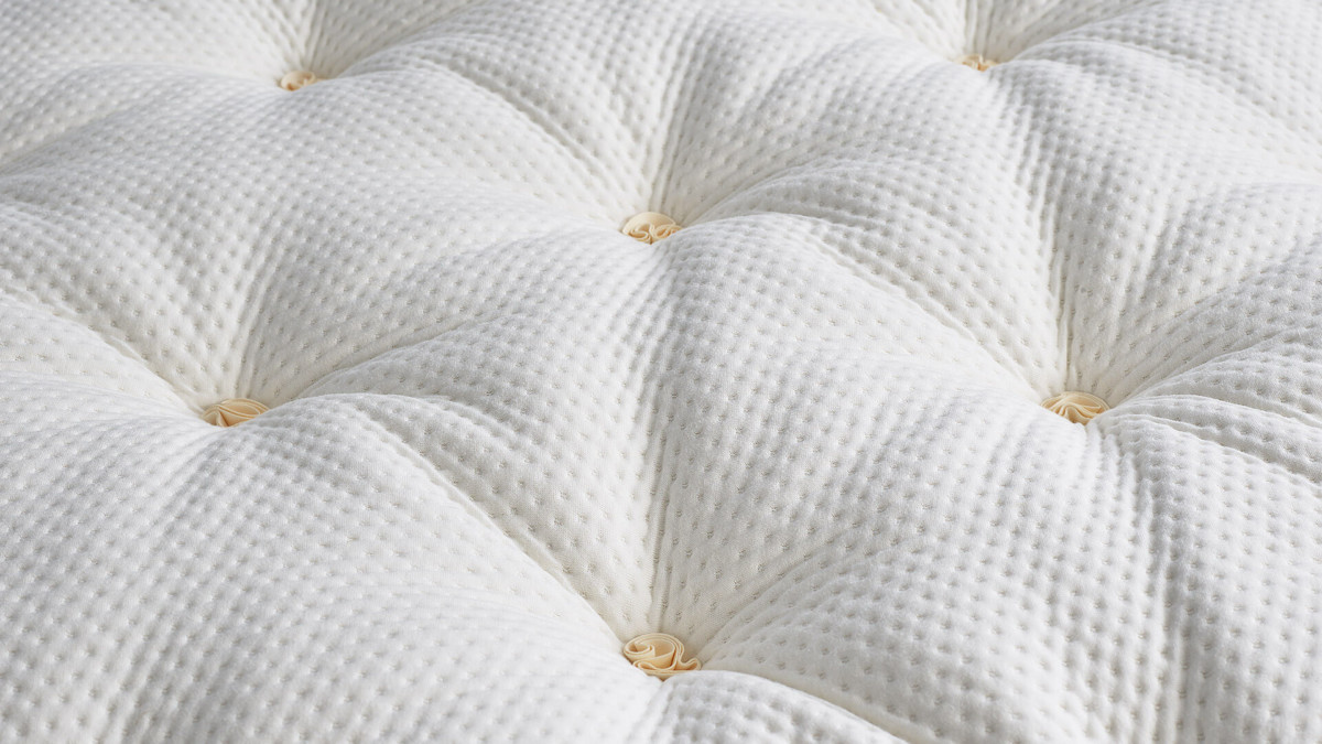 A close-up image of our luxurious Hca topper, showcasing sumptuous white cotton.