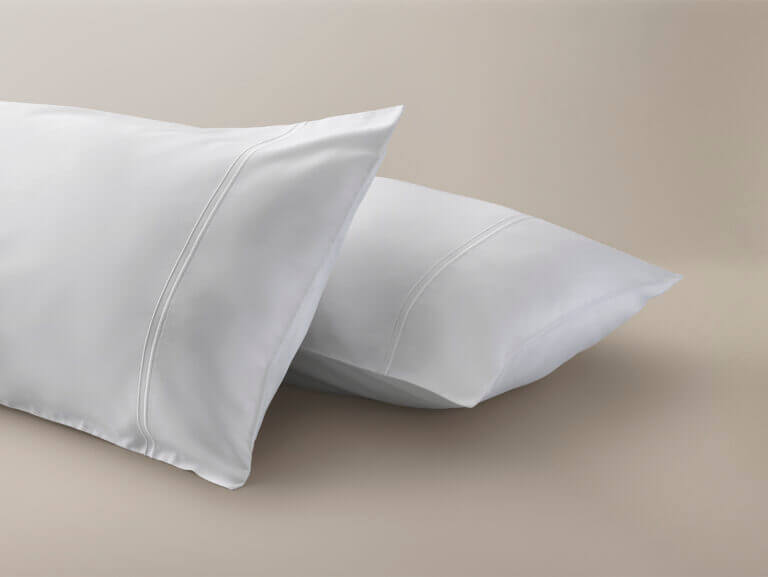 Sateen pillow cases with white cording