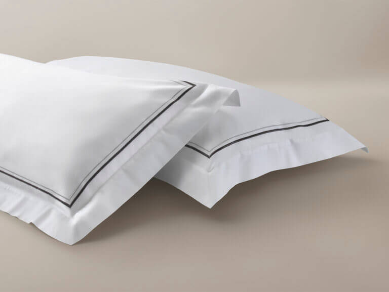 Percale pillow cases with silver/charcoal cording