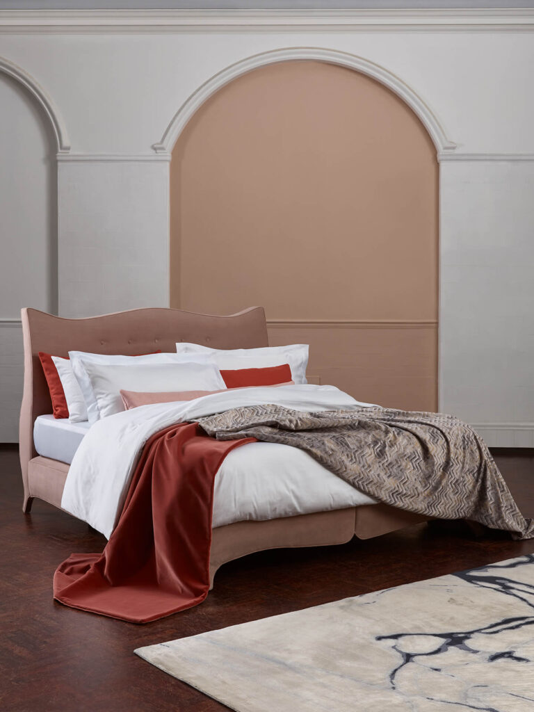 The Dream Sateen bed linen set on a Savoir bed