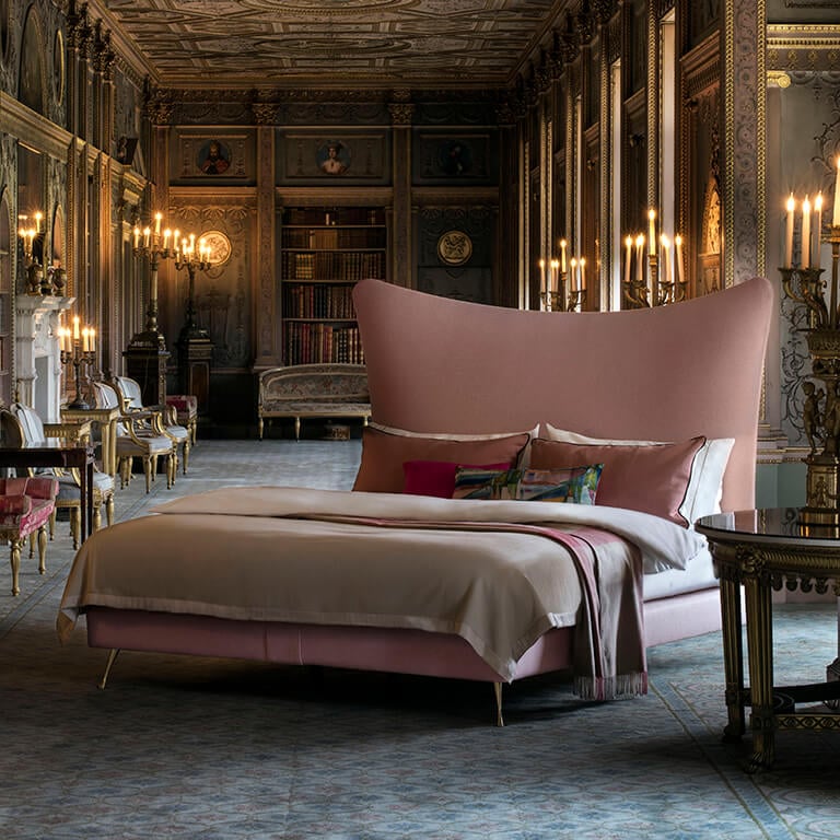 Savoir Amelia bed with a soft pink headboard photographed in a sumptuous room