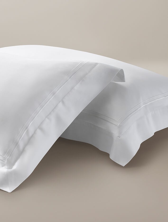 Percale pillow cases with white cording