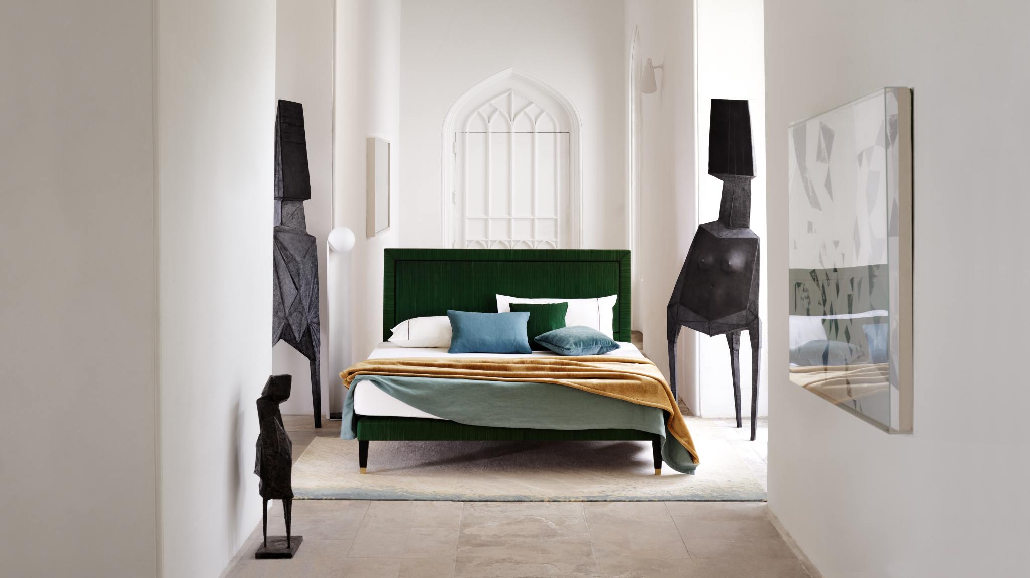 Our Virginia design featuring a dark green headboard and base upholstered in horsehair fabric by John Boyd.