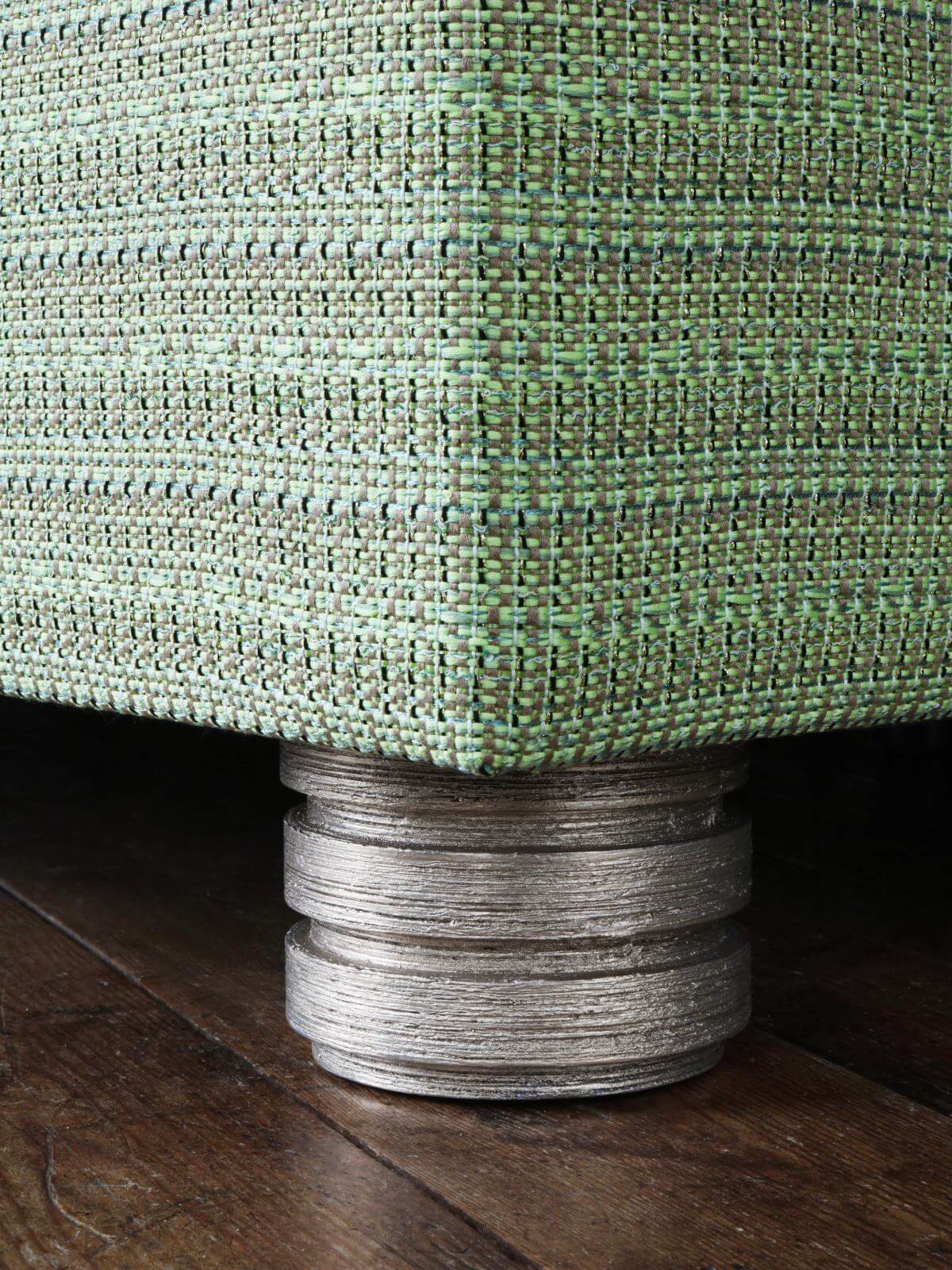 A close-up image of the Louis design, showcasing the intricate bright green tweed fabric by Francis Sultana.