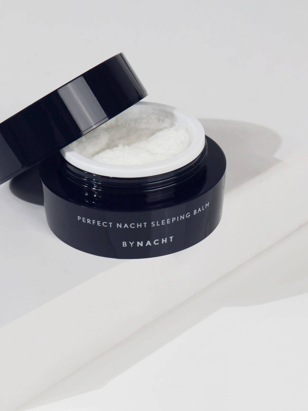 Image of BYNACHT's iconic sleeping balm, showing the open balm jar