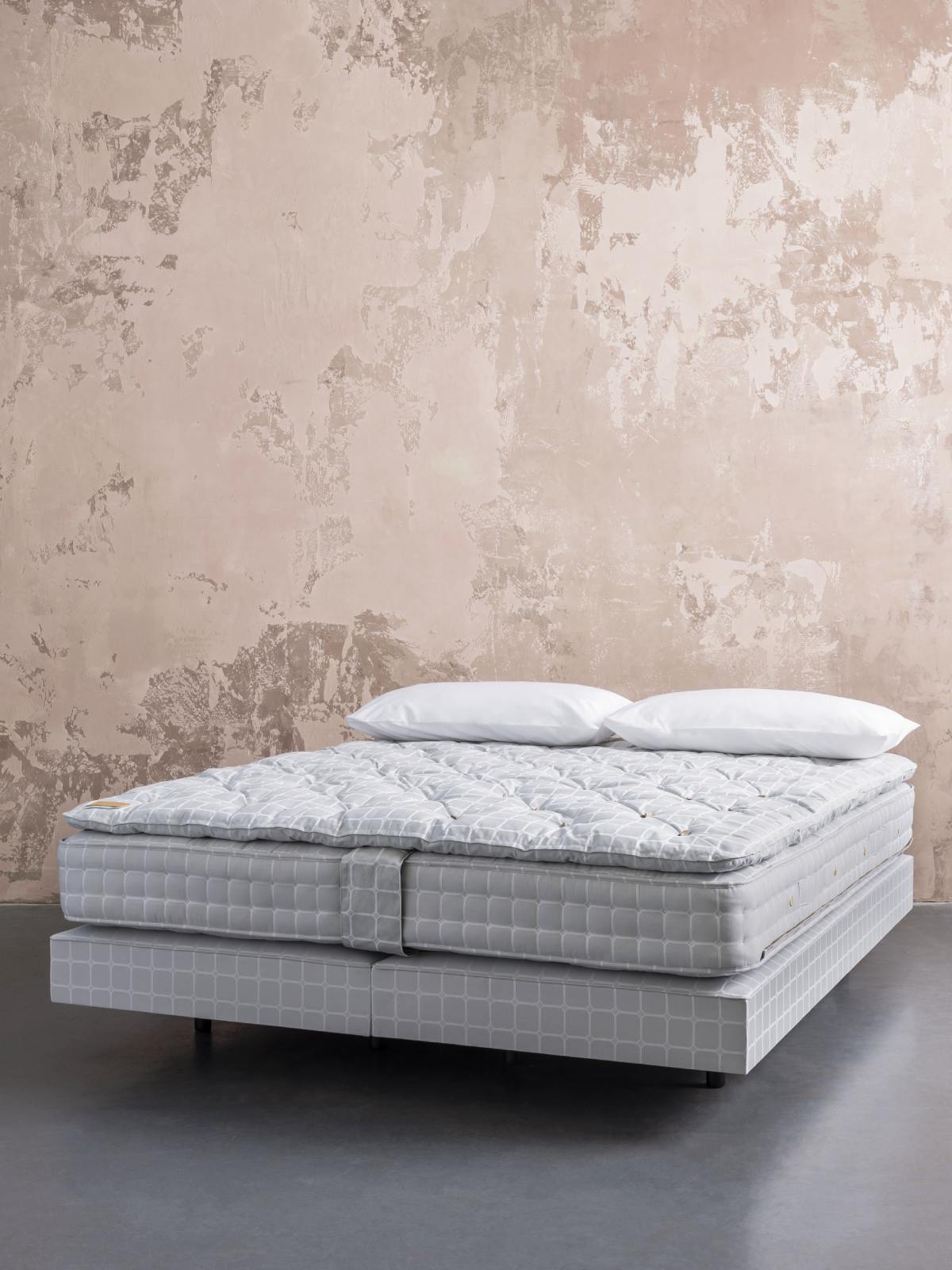 Savoir No5 bed set featuring a mattress, topper and base all upholstered in signature trellis ticking.