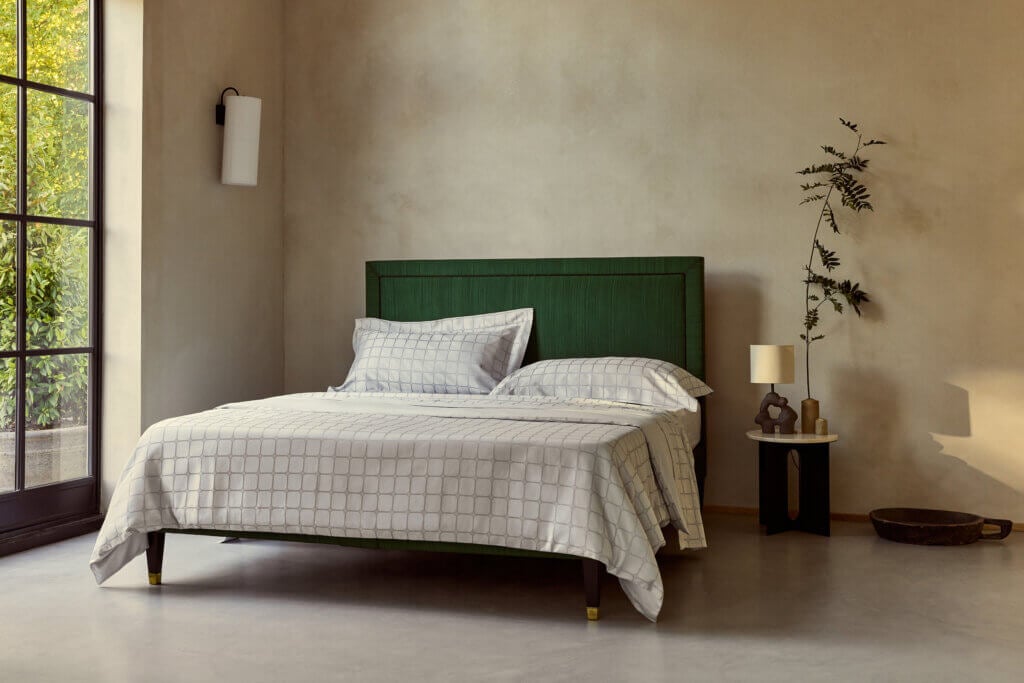 A Savoir bed dressed in the Trellis bed linen