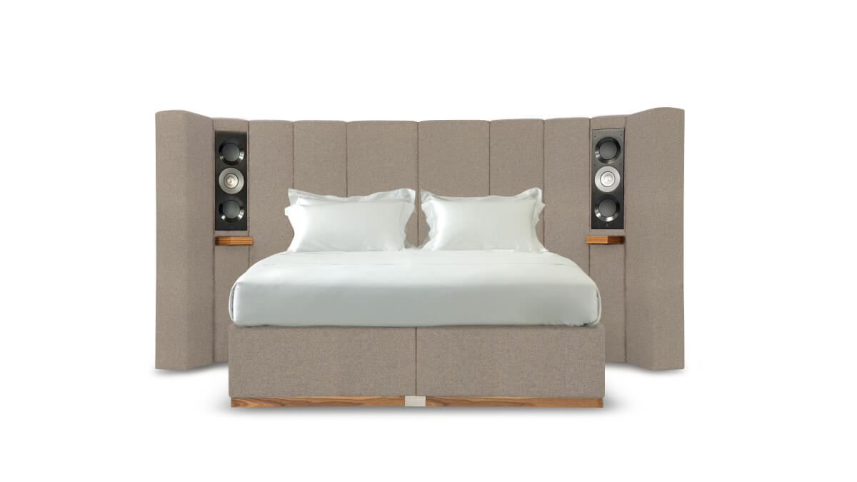 Image of the Seventy Five bed upholstered in textured beige fabric.