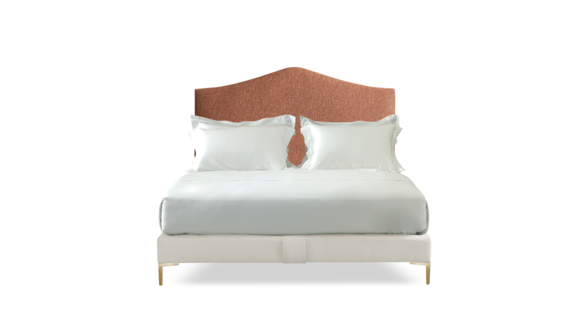 Image of the Alex headboard upholstered in textured orange fabric with a complementing pink base.