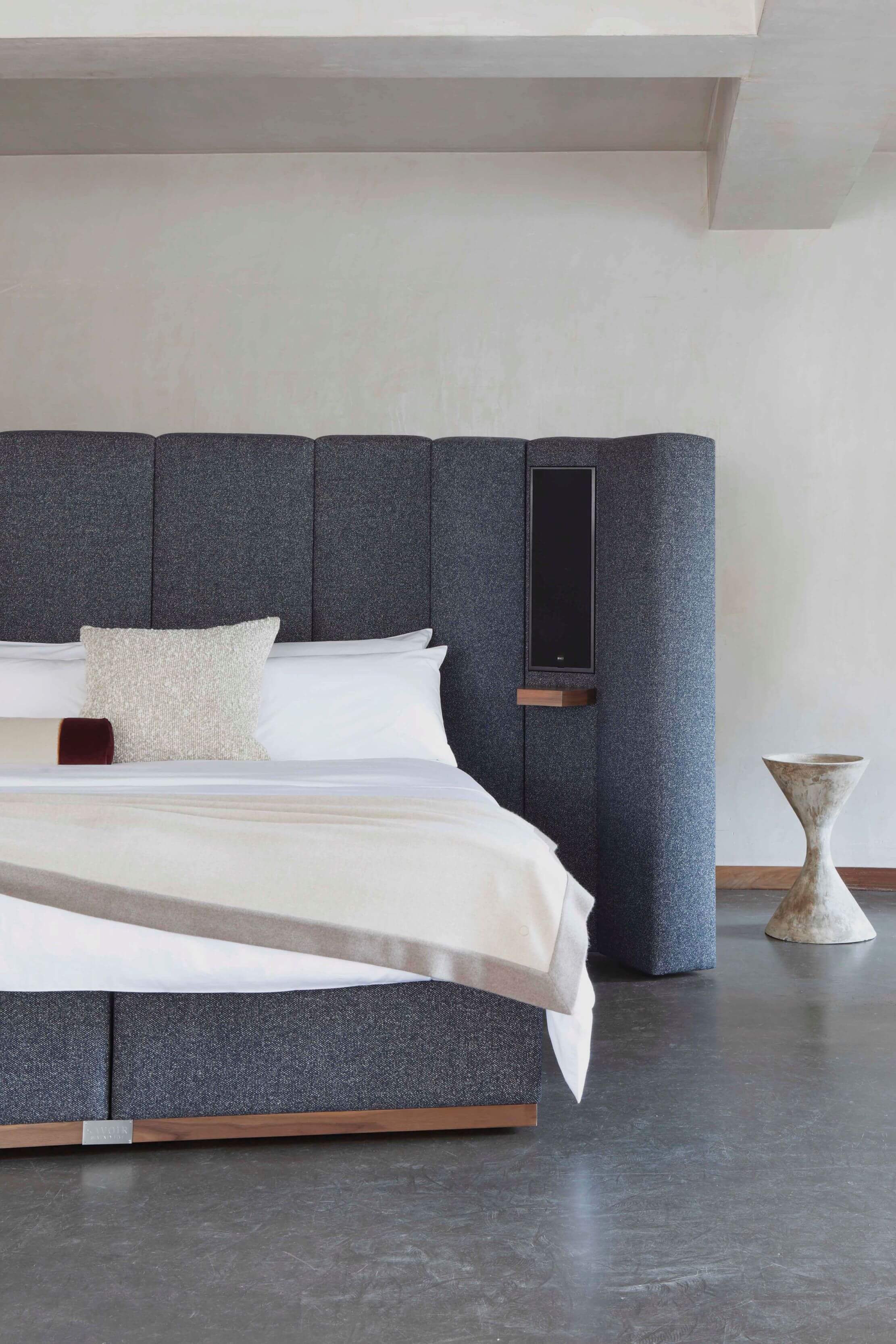 luxury bed Savoir Seventy five featuring seamlessly integrated speakers